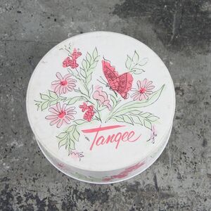 Tangee Dusting Powder box with floral and butterfly design, circa 1940s-1950s